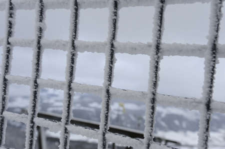 hoar frost on a fenceの写真素材