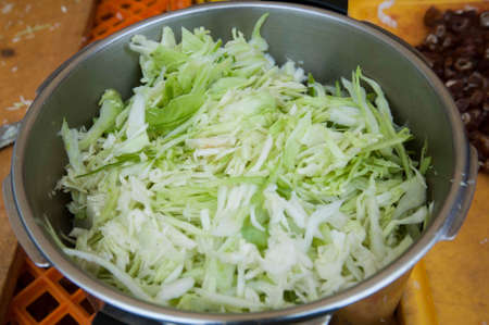 fresh cut cabbage in bowlの写真素材