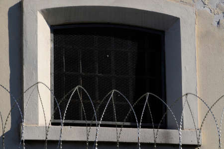 prison window and razor wire