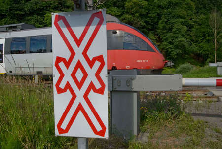 gated level crossing with crossbuckの写真素材