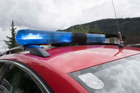 Blue light on roof of fire brigade carの写真素材