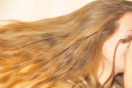 young woman with long hairの写真素材