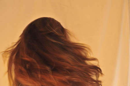 young woman with long hairの写真素材