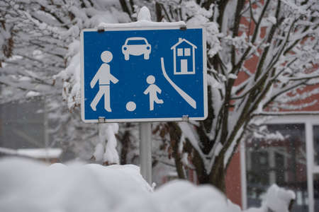 residential street sign, drive slowの写真素材