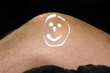 knee with a smiling face