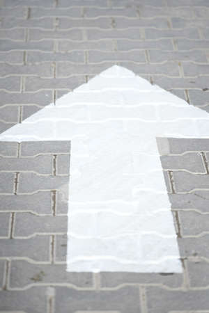 arrow pointing to a directionの写真素材