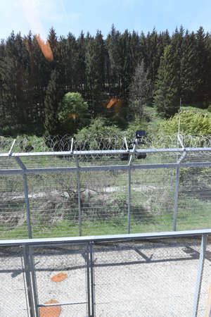 barbed wire fence as security measurement in prison