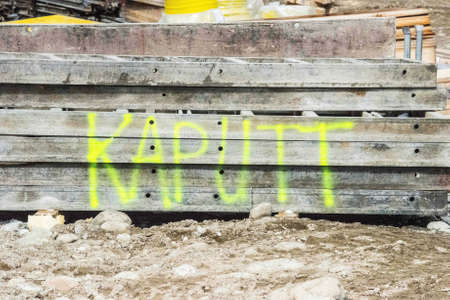 the word 'kaputt' (broken) sprayed at construction site