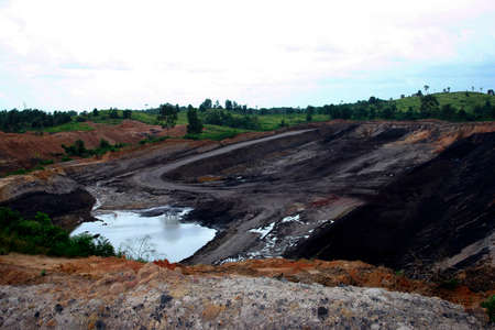 opencast coal mining in a barren landscape, industrial resource extraction