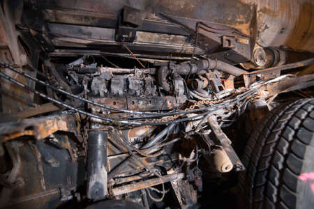 burnt out vehicle after a vehicle fire during the night