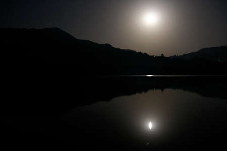 the setting evening sun, atmospheric light and shade at the end of a dayの写真素材