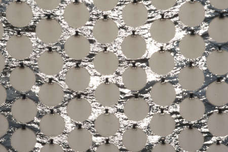 circle or round shaped object, pattern and texture on a surface