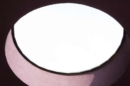 circle or round shaped object, pattern and texture on a surface