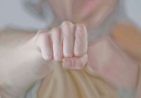 fist punch, an act of violence and aggression against others