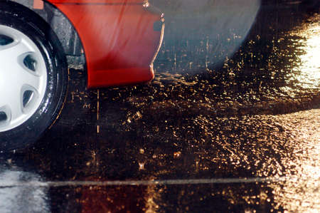 bad weather conditions and poor visibility in road traffic on a rainy dayの写真素材