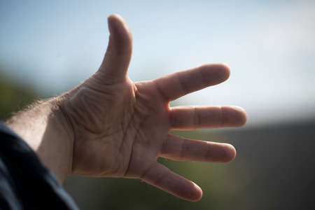 hand gestures in body language, part of non verbal communicationの写真素材