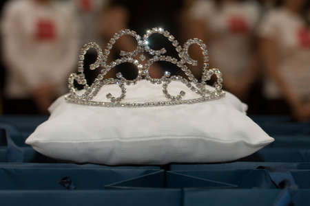 crown or coronet on a white pillow, symbol for nobility and powerの写真素材