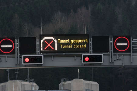 a closed car tunnel sign in road traffic and transportation
