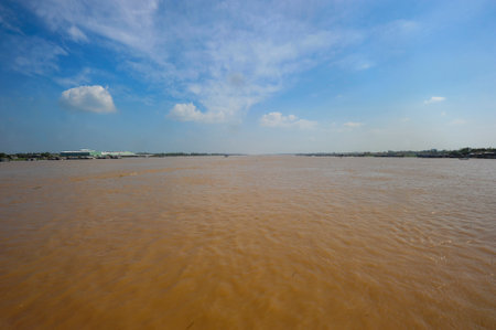 shipping and vessel traffic on the Mekong river in Vietnamの写真素材