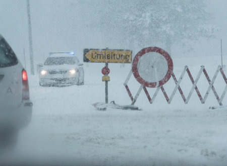 closure of a road because of heavy snowfall in winterの写真素材