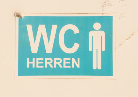 a toilet or WC sign for a public restroom, body hygiene and basic needs