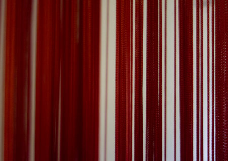 the color red, associated with danger, love, courage and passionの写真素材