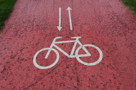 bicycle path marking on the street with pictogram of a bike