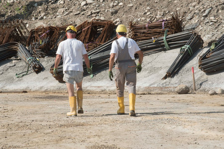 construction worker at a building site, employee in construction industryの写真素材