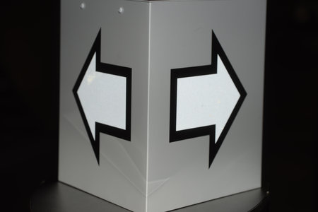 direction arrow points in one way, sign to move towards this directionの写真素材