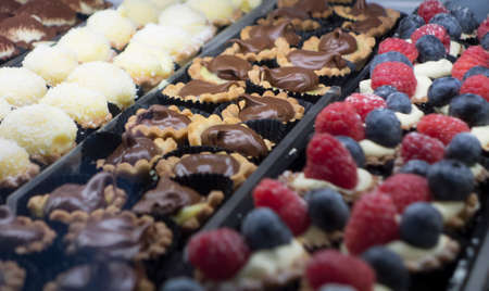 cake or pie and other sweets in the pastry shop or bakeryの写真素材