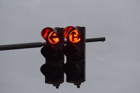 red traffic light signal on the street, symbol for stoppingの写真素材