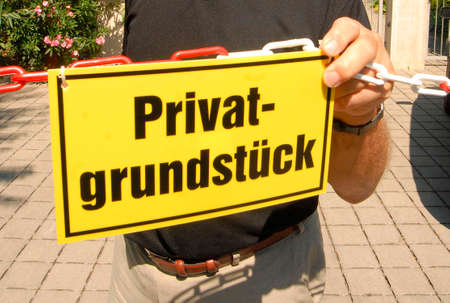 a private road or private street sign, unauthorized access prohibitedの写真素材