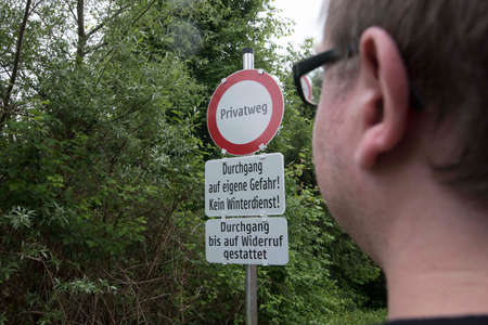 a private road or private street sign, unauthorized access prohibitedの写真素材