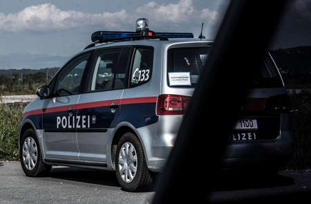 a police car for transportation and mobility in road trafficの写真素材
