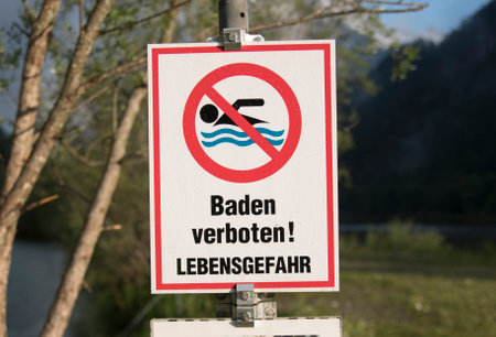 bathing ban or swimming ban sign, warning and prohibition to swimの写真素材