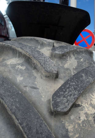 big tires of commercial vehicles in transportation and vehicle traffic