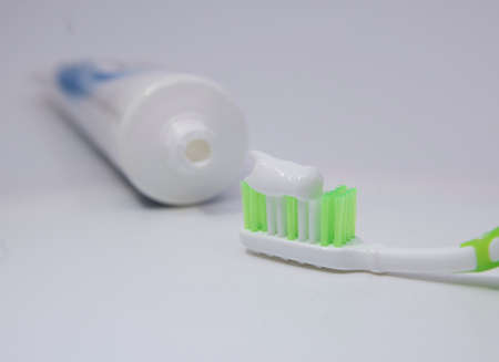 brushing the teeth with a toothbrush and toothpaste, dental hygiene