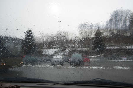 bad weather conditions and poor visibility in road traffic on a rainy day