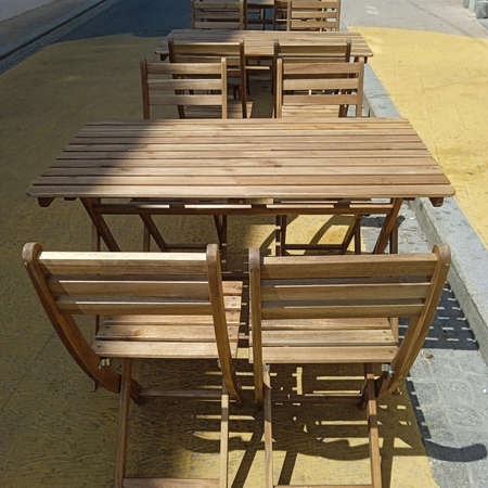 empty beer garden or schanigarten, sidewalk seating and gastronomy in summer