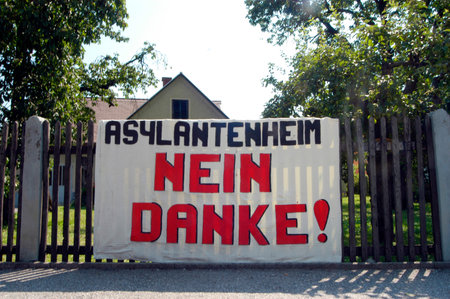 racism against foreigners and refugees as a problem in societyの写真素材