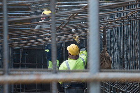 construction worker and reinforced concrete, building at the construction site