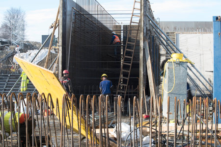 construction worker and reinforced concrete, building at the construction site