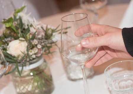 the table setting in gastronomy, tablecloth and tableware in a restaurantの写真素材