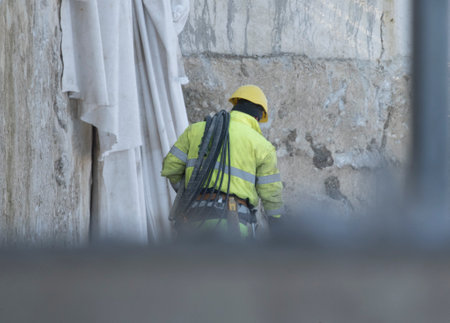 construction worker at a building site, employee in construction industry