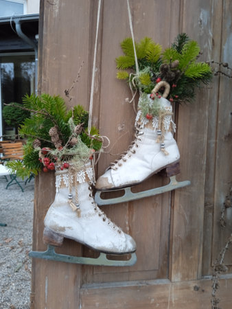 ice skating and sports in winter on a skating rinkの写真素材