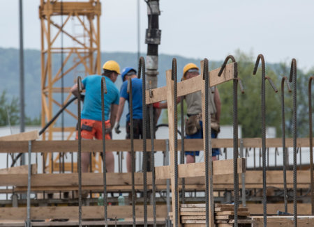 construction worker and reinforced concrete, building at the construction site