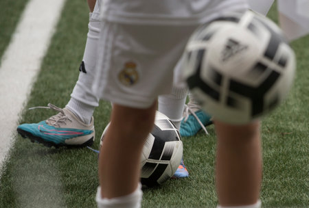 children playing a football gameのeditorial素材