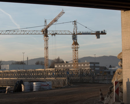 a construction crane from the Liebherr company at construction siteのeditorial素材