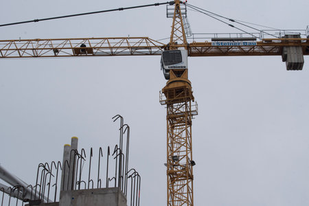a construction crane from the Liebherr company at construction siteのeditorial素材