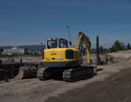 wacker_neuson excavator at a construction site, heavy machinery for earthworks and building projectのeditorial素材
